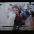 Zdjęcie ciężko rannego Kaddafiego
