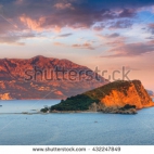 stock-photo-view-of-sveti-nikola-island-and-budva-riviera-at-sunset-dramatic-evening-sky-montenegro-adriatic-432247849