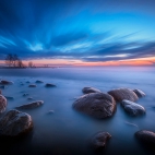 Finland_Coast_Stones_Evening_Sky_Clouds