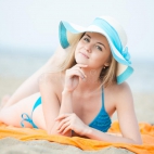 young-lady-sunbathing-beach-beautiful-woman-posing-summer-sand-outdoor-summer-portrait-pretty-sport