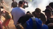 Car Sprays Burning Fuel Into Crowd During Motor Event.mp4