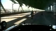 ATV does wheelie down the interstate